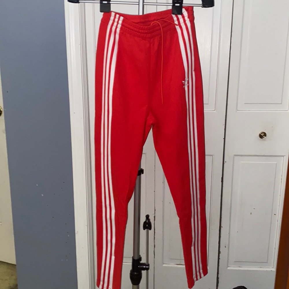 Adidas cotton polyester blend track pants in red size Ss